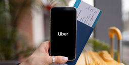 Traveler using the Uber app
