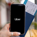 Traveler using the Uber app
