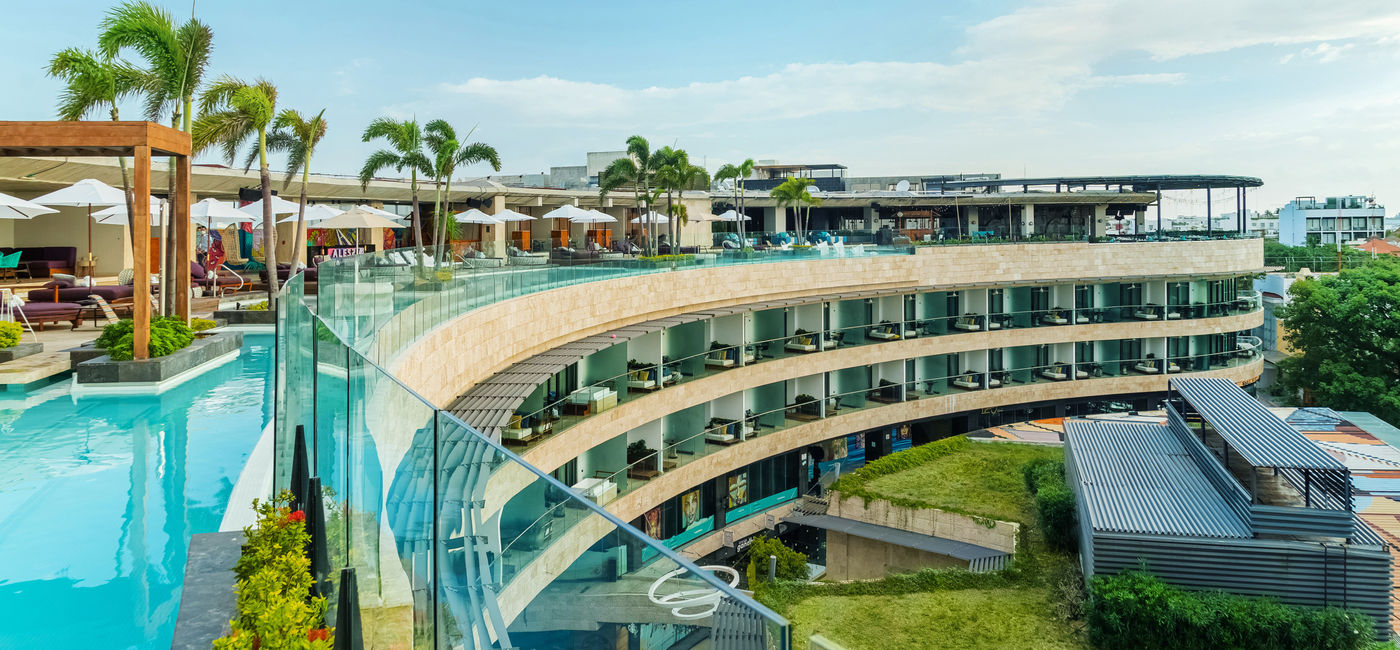 Image: View of the rooftop pool and lounge area at the rebranded Hyatt Centric Playa del Carmen. (Photo Credit: Hyatt)