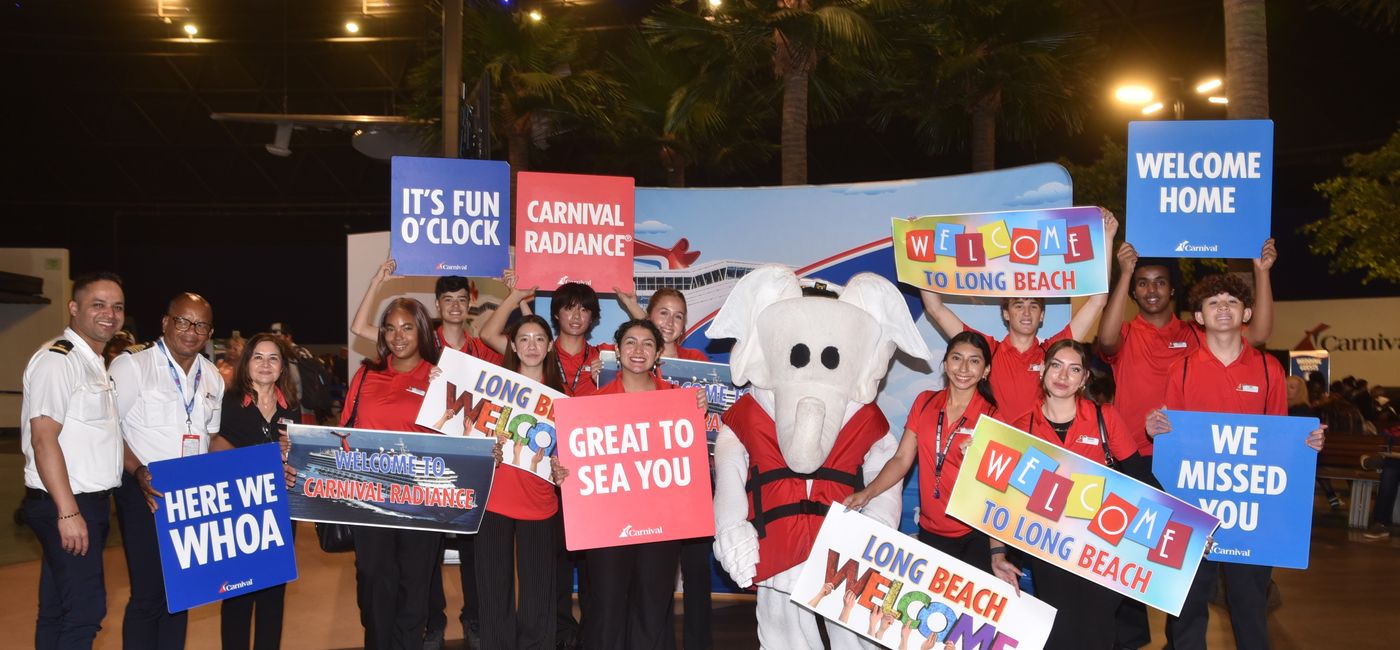 Image: Carnival Cruise Line fun-terns welcome guests aboard (Photo Credit: Carnival Cruise Line)