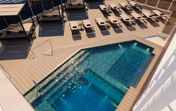 The MSC Yacht Club pool deck on MSC Magnifica