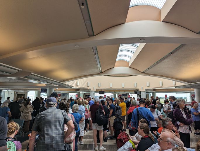 Airport crowd, people, travelers, travel, traveling, crowds, gate, gate lice,