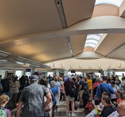 Airport crowd, people, travelers, travel, traveling, crowds, gate, gate lice,