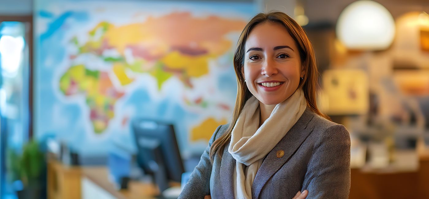Image: Travel advisor working at an agency. (Photo Credit: Adobe Stock/Christopher (generated with AI))