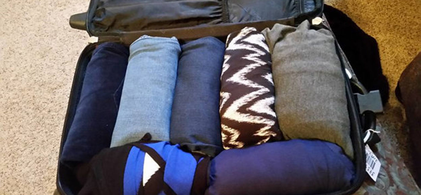 Image: PHOTO: Rolling your clothes helps keep them wrinkle-free. (Photo by Holly Johnson)