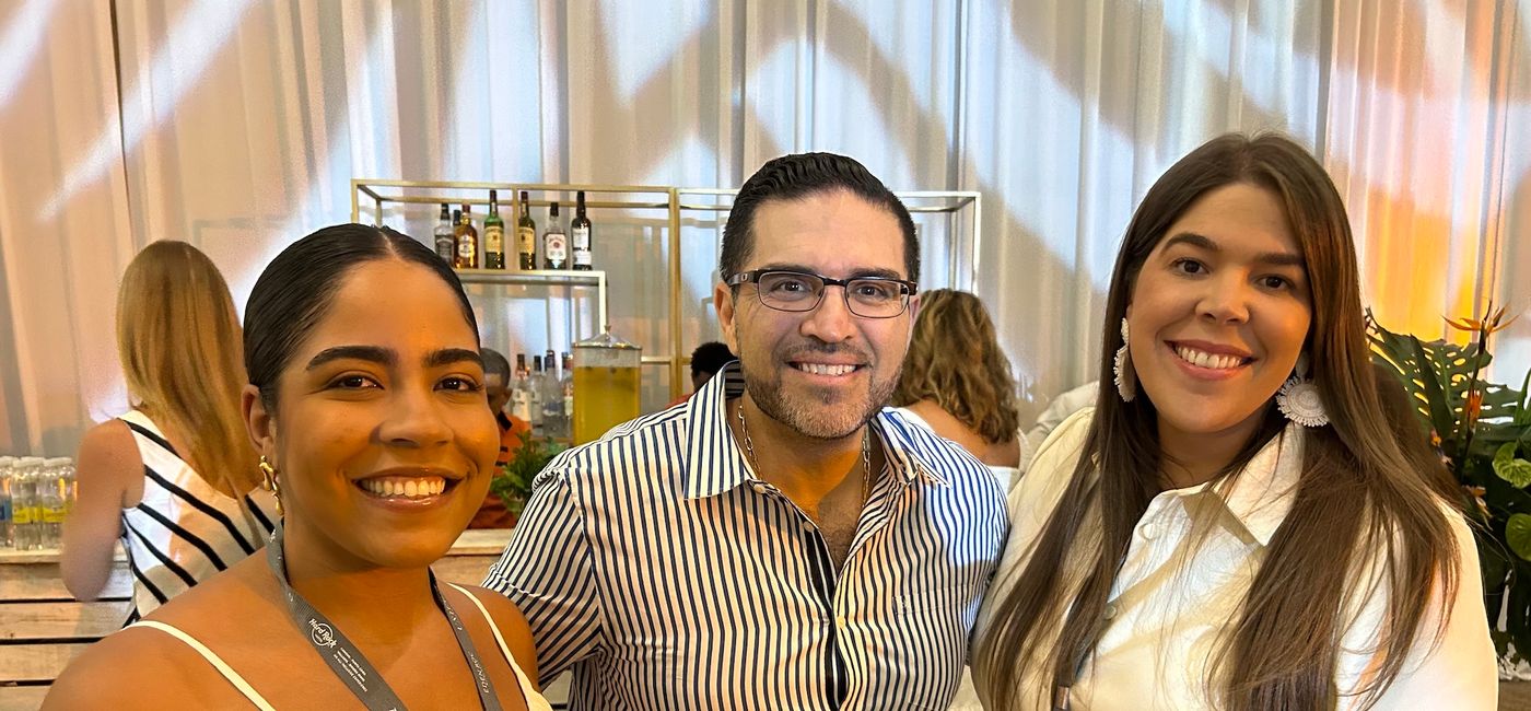Image: LtoR: Bonnie Helena, Director PR, AIC Ramon Romero - Director of Sales and Marketing at Hard Rock Hotel & Casino Punta Cana , Carilis DiDonato - Director of Field Sales at AIC Hotel Group. (Photo Credit: Marsha Mowers)