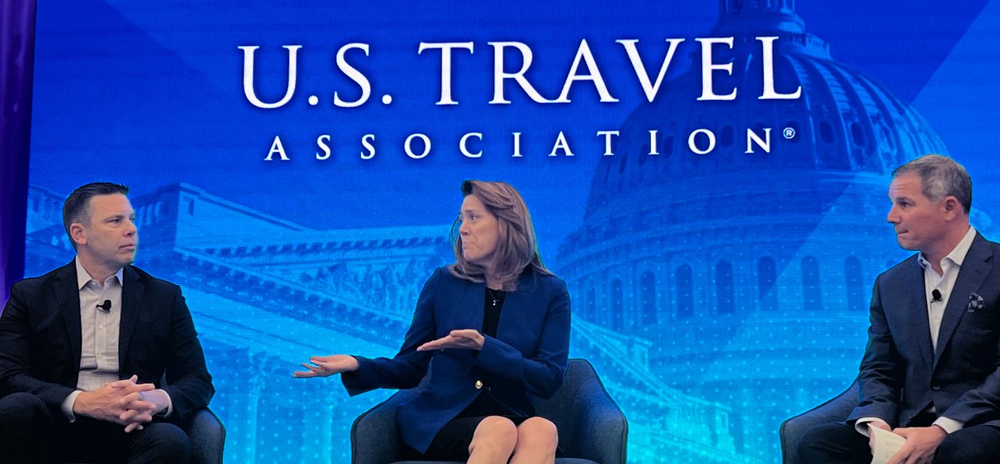 Image: U.S. Travel Association President Geoff Freeman and two members of the association's new Commmission on Seamless & Secure Travel at IPW 2024