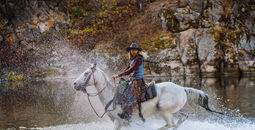 Horseback riding at The Resort at Paws Up, Greenough, Montana.
