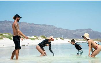 A family at the beach in Loreto, Mexico.