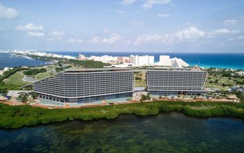 Exterior of Hyatt Vivid Grand Island building- lagoon side.
