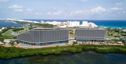 Exterior of Hyatt Vivid Grand Island building- lagoon side.