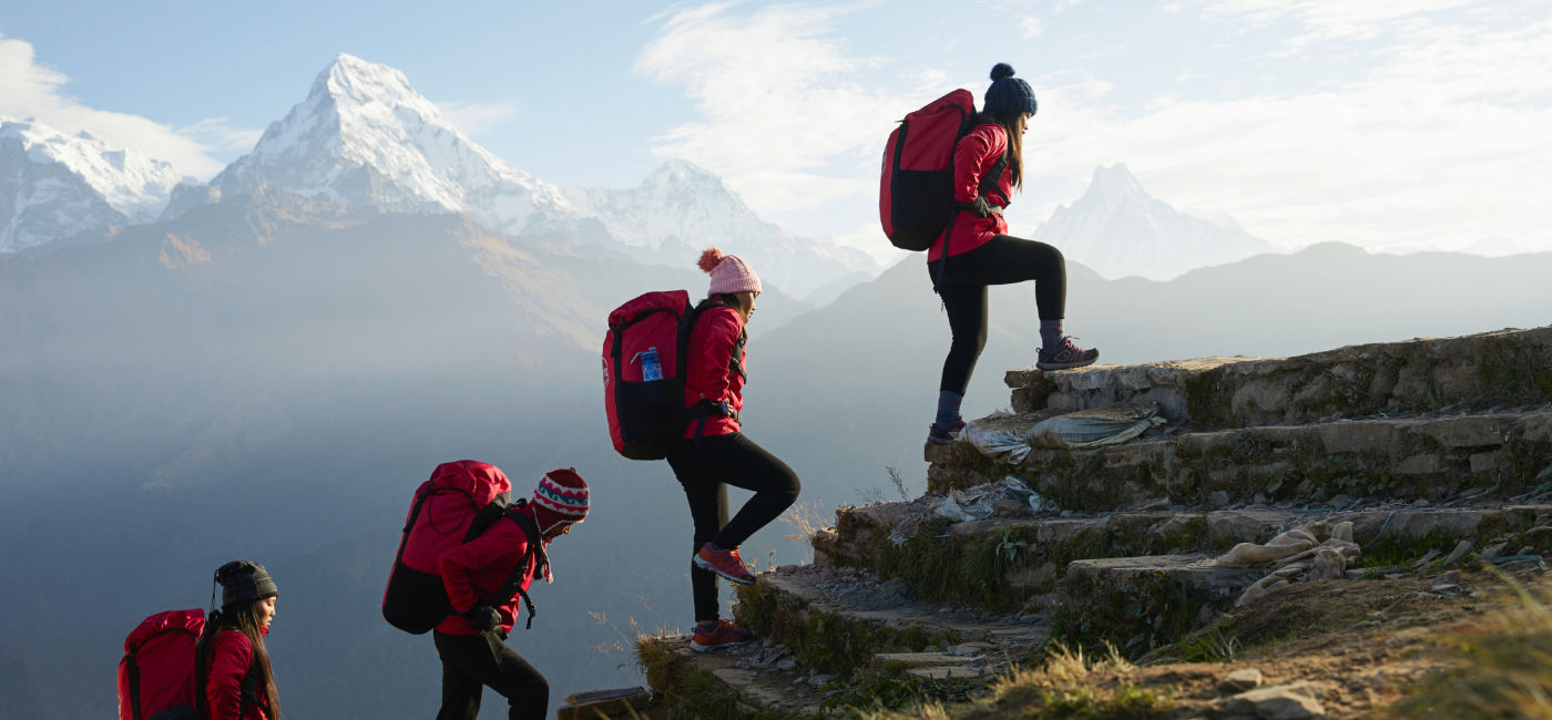 Image: Intrepid hikers trek at Poon Hill in Nepal. (Photo Credit: Intrepid Travel)