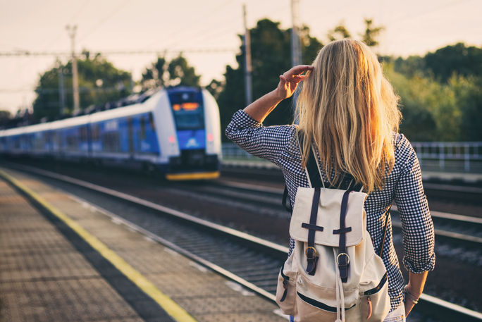 Traveler at a European rail station Europe travel, rail travel, Eurail, train travel