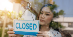 Woman closing her business.