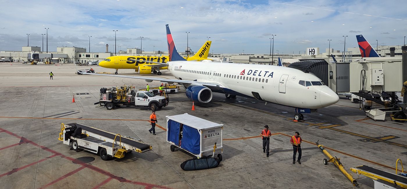 Image: Delta and Spirit planes at Atlanta Hartsfield Jackson International Airport (Photo Credit: Eric Bowman)