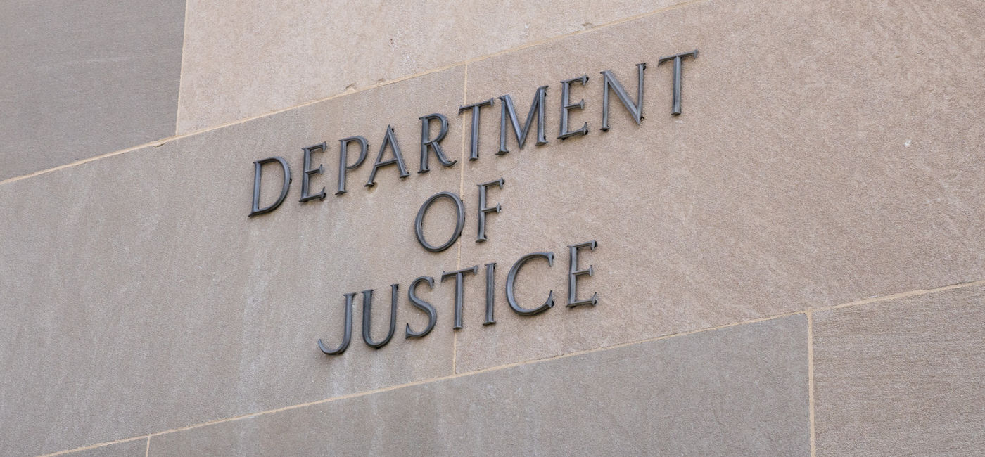 Image: US Department of Justice building in Washington, DC. (Photo Credit: Heidi/Adobe)