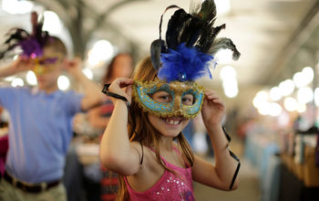 Masked girl at parade.