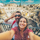Tourists posing for a selfie in the south of Italy