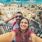 Tourists posing for a selfie in the south of Italy
