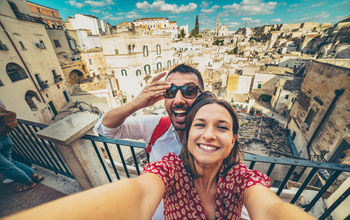 Tourists posing for a selfie in the south of Italy