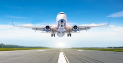 Passenger airplane landing on a runway.