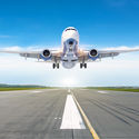 Passenger airplane landing on a runway.