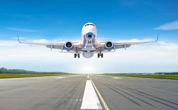 Passenger airplane landing on a runway.