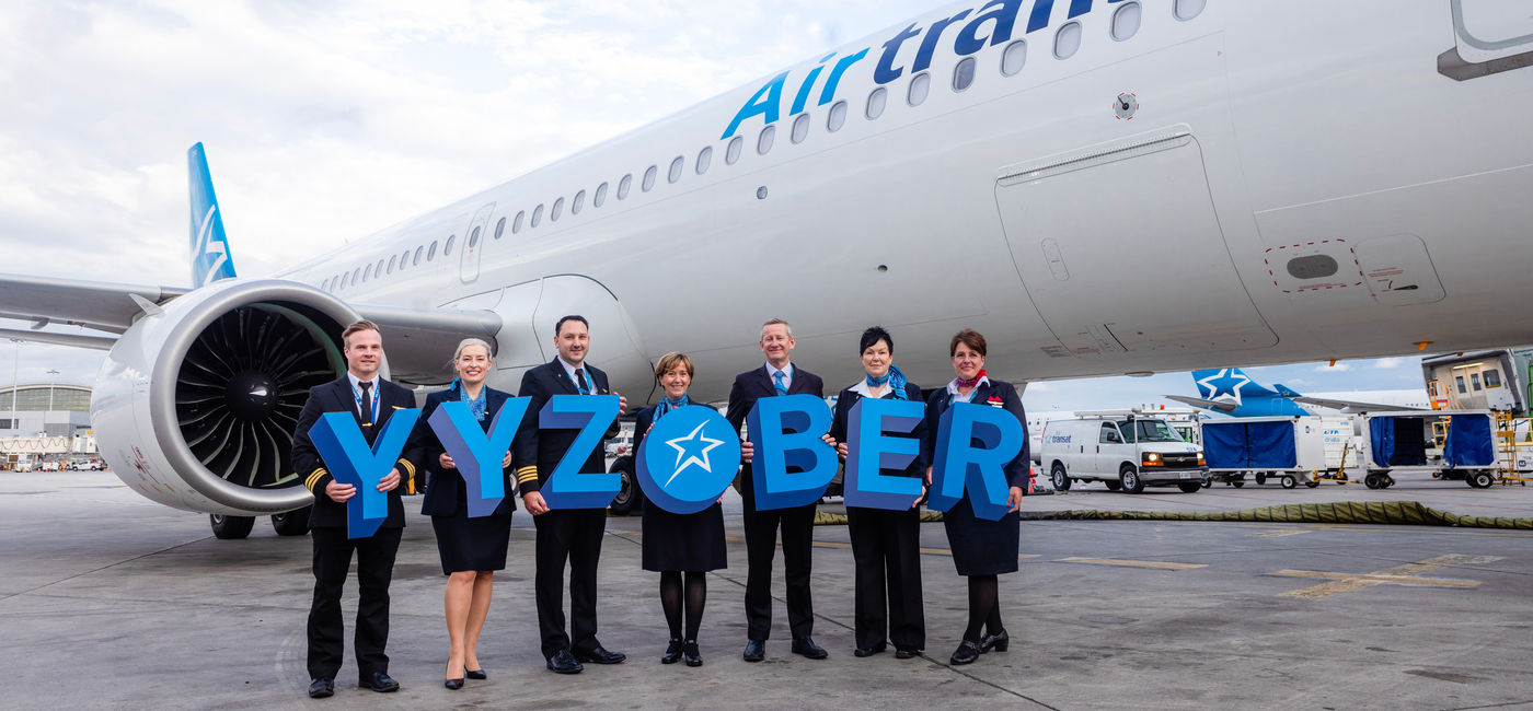 Image: Crew members of Air Transat’s inaugural flight to Berlin. (Photo Credit: Air Transat)