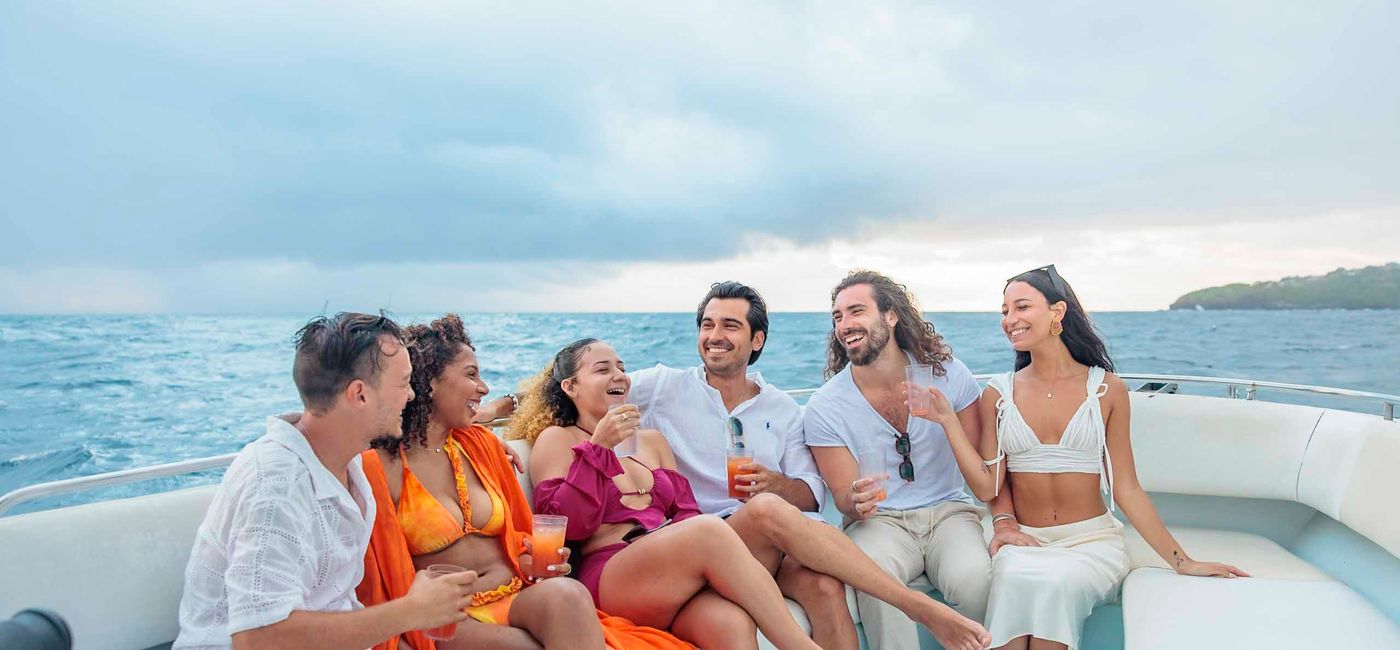 Image: A group enjoys a private boat tour with Island Routes. (Photo Credit: Island Routes)
