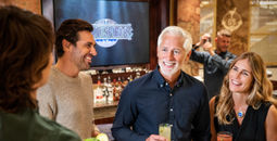 Princess Cruises guests enjoying a drink at the Good Spirits At Sea bar.