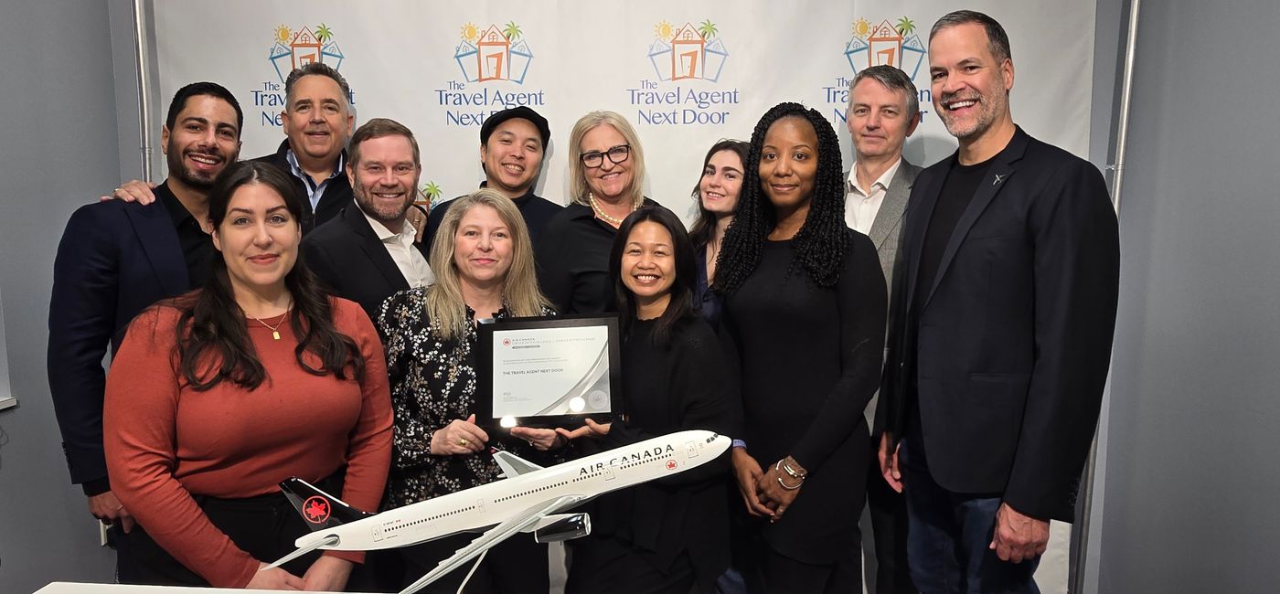 Image: TTAND team members celebrate being named to the Air Canada Circle of Excellence again this year. (Photo Credit: TTAND)