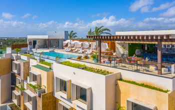 Rooftop pool with rooftop bar and pool cabanas