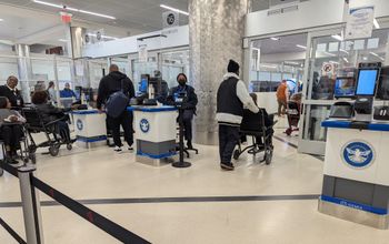 TSA security line, travel, travelers, crowd, wheelchair,