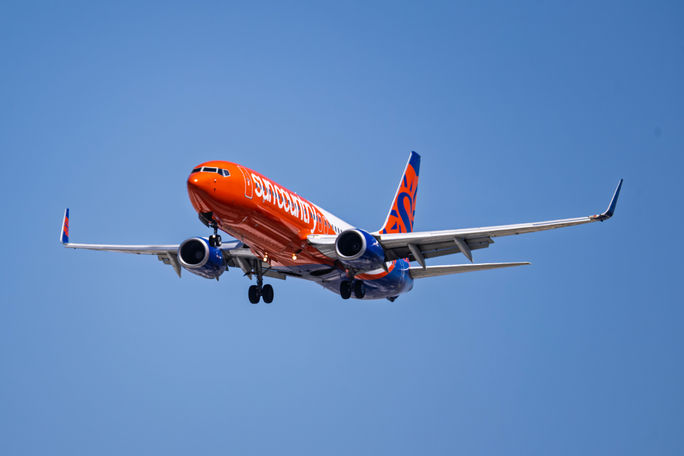 Sun Country Airlines plane arriving at Harry Reid International Airport.