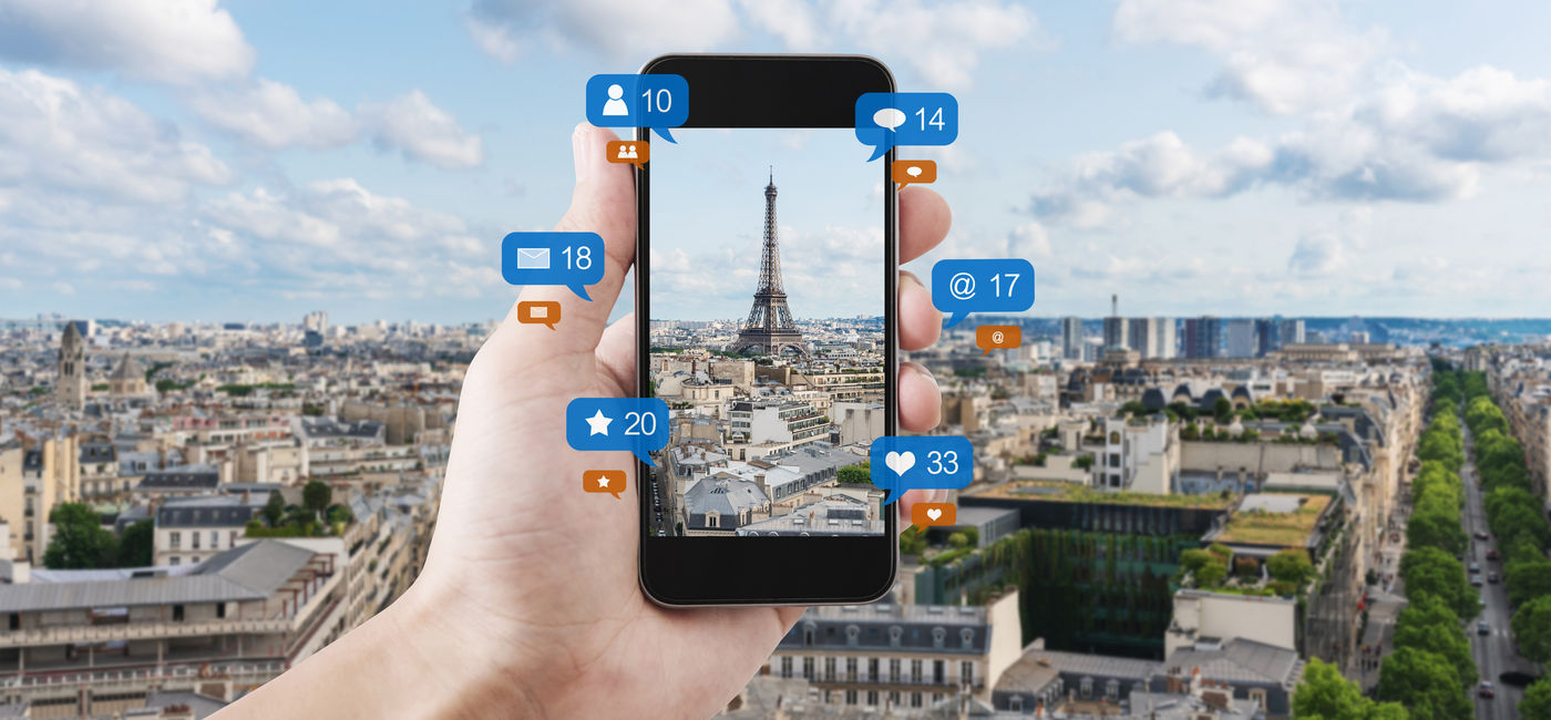 Image: Could you detach from your smartphone for an entire trip? (Photo Credit: iStock/Getty Images Plus/SasinParaksa)