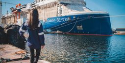 Captain Kate McCue, the first American female cruise ship captain, watches as construction continues on Celebrity Beyond at the Chantiers de l'Atlantique shipyard in Saint-Nazaire, France.