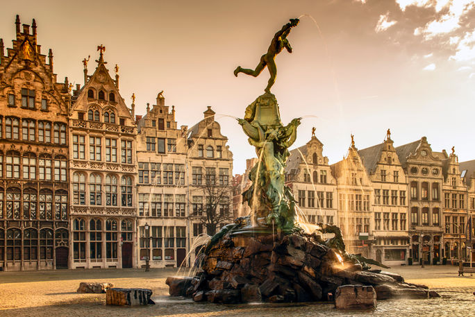 Brabo Fountain in front of the Town Hall on the Grote Markt Square in Antwerp, Belgium (Photo by littlewormy/iStock/Getty Images Plus)