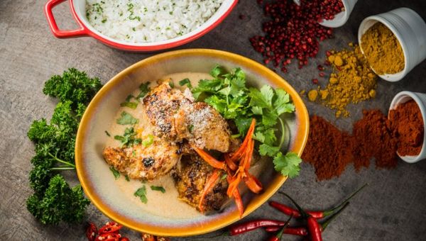 The African chicken is first grilled, then topped with spicy piri piri sauce which gives a unique flavour mix of pepper, herbs, and in some places, curry sauce too. The African chicken is first grilled, then topped with spicy piri piri sauce which gives a unique flavour mix of pepper, herbs, and in some places, curry sauce too.