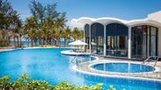 The stunning infinity pool on the rooftop of Best Western Premier Bayphere Pattaya overlooks tranquil Jomtien Beach.