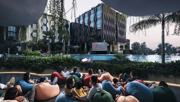Travellers can unwind at Village Hotel Sentosa with a movie night under the stars, lounging on bean bags or floats at the pool every weekend evening. Travellers can unwind at Village Hotel Sentosa with a movie night under the stars, lounging on bean bags or floats at the pool every weekend evening.