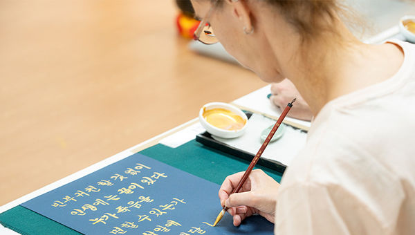 At Bongeunsa Temple, visitors can try their hand at Korean calligraphy writing.
