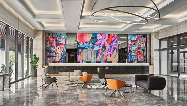 Guests are imbued with a sense of place when they enter the hotel lobby, with iconic images of olden-day shophouses displayed on a colourful LED mural. Guests are imbued with a sense of place when they enter the hotel lobby, with iconic images of olden-day shophouses displayed on a colourful LED mural.