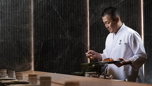 Chef Yoshinori Kinomoto of Zuicho (pictured) at The Karl Lagerfeld Hotel will team up with Chef Yūsaku Nakamura of Kyoto’s Michelin-starred Koko restaurant for a multi-sensory feast that celebrates the elegance of Japanese fare. Chef Yoshinori Kinomoto of Zuicho (pictured) at The Karl Lagerfeld Hotel will team up with Chef Yūsaku Nakamura of Kyoto’s Michelin-starred Koko restaurant for a multi-sensory feast that celebrates the elegance of Japanese fare.