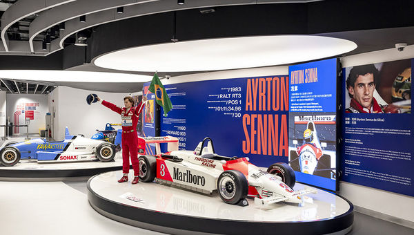 The Macao Grand Prix Museum showcases vintage racing cars, interactive exhibits, a Formula 3 simulator, and features wax figures of racing legends.