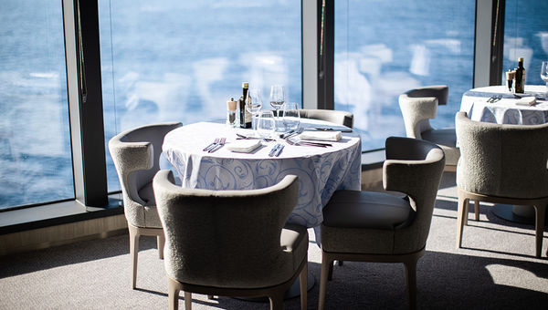 Sila onboard Le Commandant Charcot offers buffet-style meals and themed dinners with global dishes like Thai curries, French classics, and salads that guests can enjoy while gazing out at the icy expanse of the Arctic. Sila onboard Le Commandant Charcot offers buffet-style meals and themed dinners with global dishes like Thai curries, French classics, and salads that guests can enjoy while gazing out at the icy expanse of the Arctic.