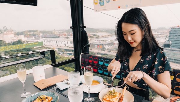 Diners can take in stunning aerial views of Sentosa while celebrating special occasions at Mount Faber’s Cable Car Sky Dining.