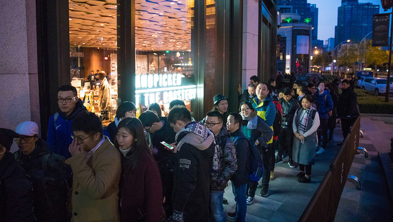 First Roastery customers line-up for a Starbucks coffee in Shanghai.