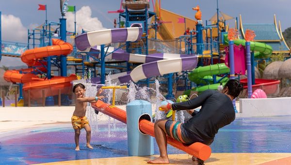 The park features 12 slides, 36 activities, a FlowRider Double surf simulator and a toddler splash zone. The park features 12 slides, 36 activities, a FlowRider Double surf simulator and a toddler splash zone.