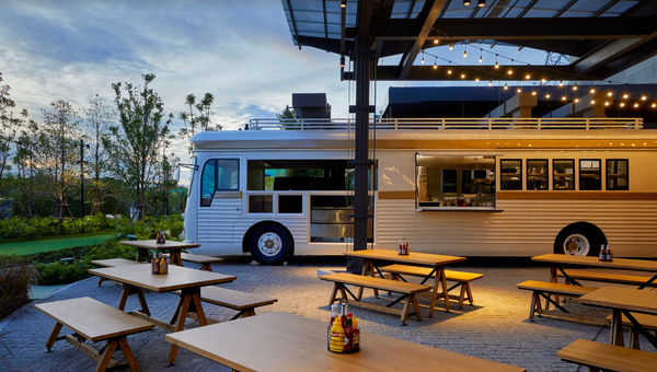 A custom-built food bus dubbed Busted! serves up American barbecue and Thai grilled meats with a spicy Isaan accent.