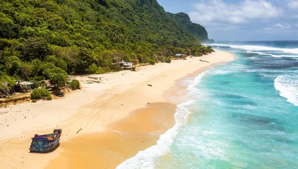 Nyang Nyang Beach in Bali offers a secluded escape with soft golden sands, stunning cliffs, and tranquil waves, perfect for solitude and natural beauty.